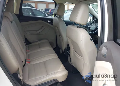 2017 Ford Escape Titanium z USA, uszkodzony, nr VIN 1FMCU0J94HUC92556